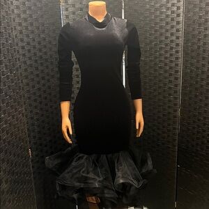 Elegant Black Dress with Flared Hem